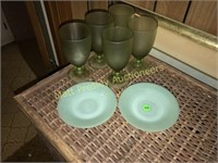 TWO JADEITE SAUCERS AND FIVE GREEN GOBLETS