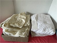 2 Stacks of bed linens- unknown size