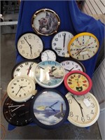 10 plastic wall clocks, various makes