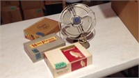 Vintage fan, cigar boxes