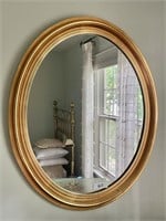 31" framed oval wall mirror