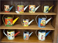 Collection of Early Tin Toy Watering Cans