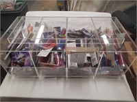 300 count cosmetics in plexiglass display