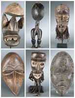 6 Dan style masks and figures. 20th century.