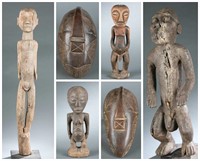 6 African masks and figures. 20th century.