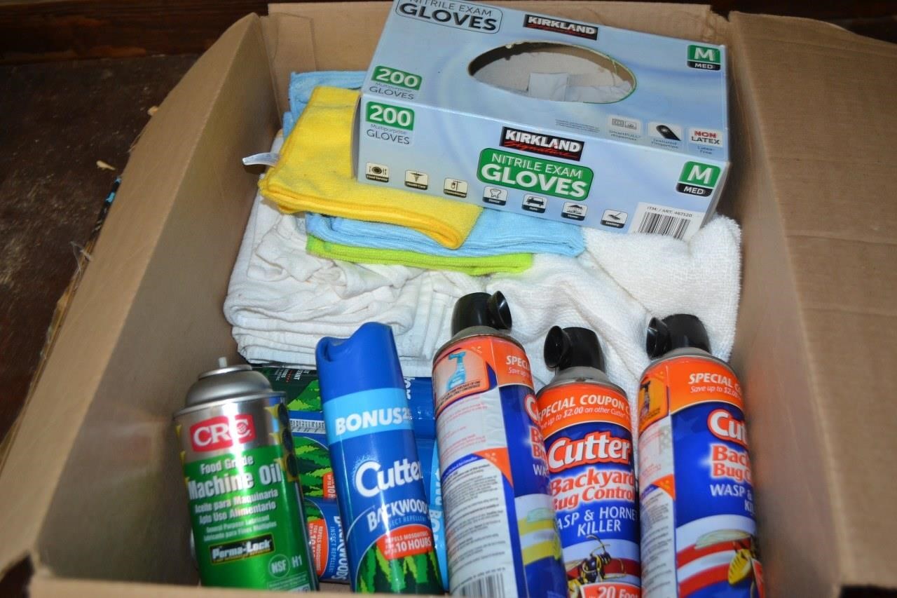 117: box with bug spray and shop towels