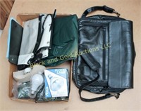 Box of office supplies, messenger bag