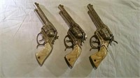 Three Gene Autry cap guns
