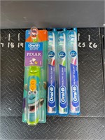 Brand new one spinbrush and 3 toothbrushes