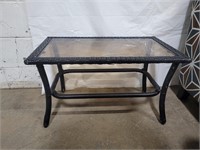Glass top wicker coffee table  28" w x 16 " h