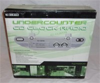 New under counter CD clock radio.