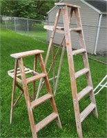 2 wooden step ladders