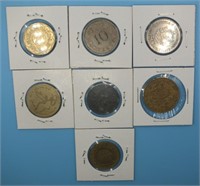 (7) LARGE FOREIGN COINS