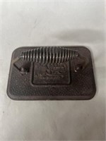 Cracker Barrel cast iron grill press 
7”x 4.5”