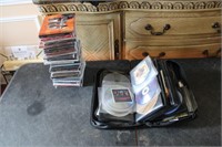 CD lot in folder with cases