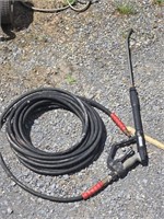Pressure washer hose with wand