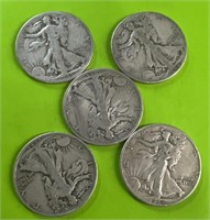 (5) silver half dollars