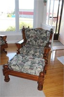 Wood frame armchair with two six button tufted