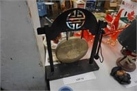 Chinese gong with mallet on metal stand