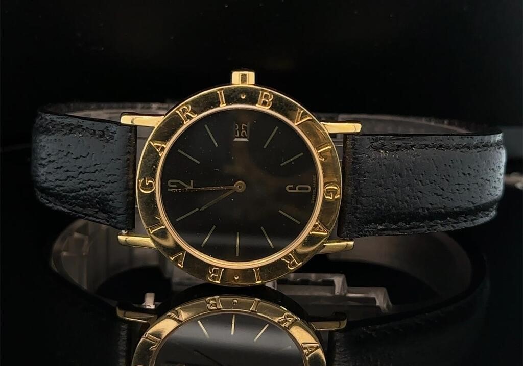 BVLGARI MID SIZED UNI-SEX SOLID 18CT GOLD WATCH