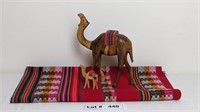 WOODEN CARVED CAMELS AND 47"X47" TABLE CLOTH