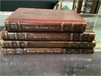 4 leather bound books