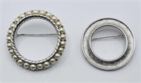 Pair of Vintage Silver Tone Trifari Round Brooches