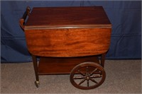 Mahogany drop leaf tea cart, single drawer above s