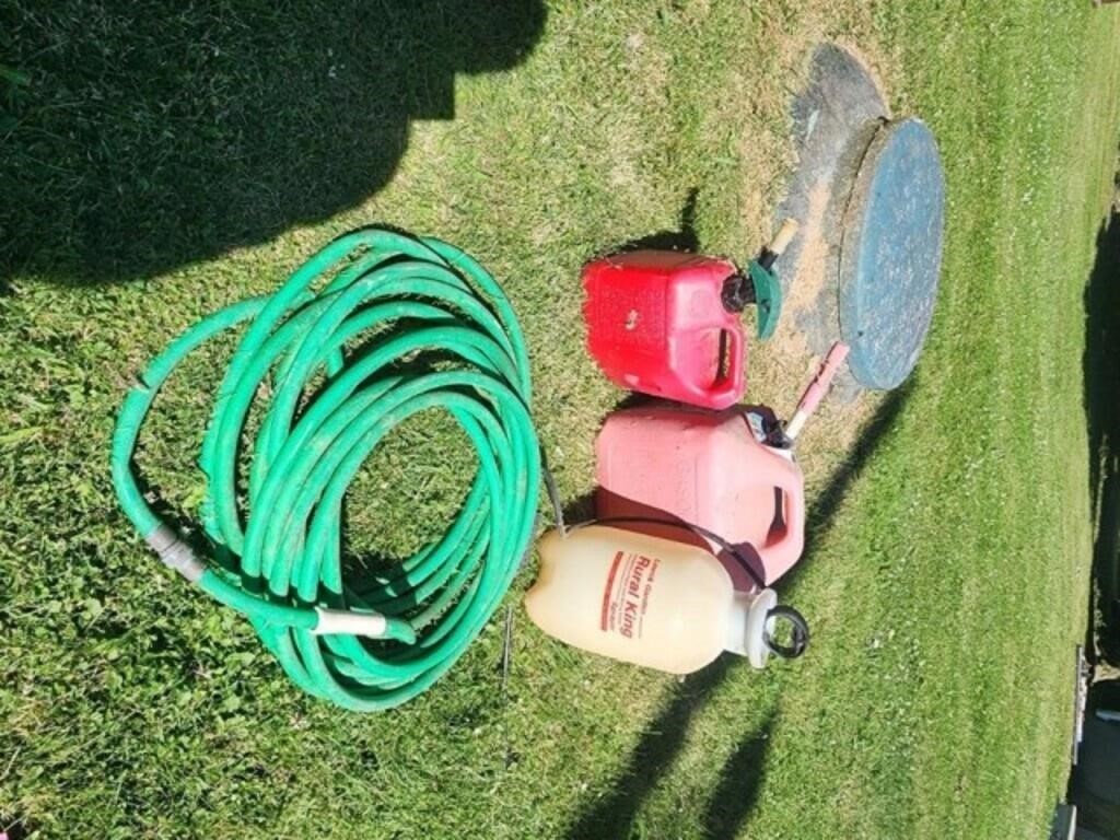 Gas cans  sprayer   garden hose.