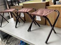 Three quickset camping stools