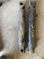 pair of quickie grapple cylinders