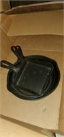 Cast iron pans and wooden serving tray