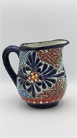 Bold color pottery pitcher