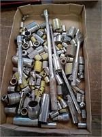 Group of assorted sockets ratchets and extensions