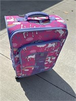 Unicorn child’s rolling suitcase.