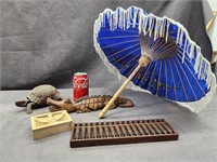 Small painted parasol,  abacus, carved wood