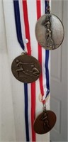 COLLECTION OF SPORTS MEDALS AND RIBBONS