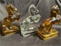 Glass Horse Book endS, Two are Amber one is clear