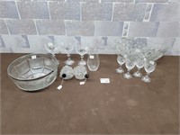 Crystal glasses, vase, grape bottles, bowl