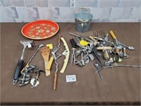 Vintage kitchen tools, some with bone like handles