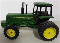 Die-cast John Deere toy tractor