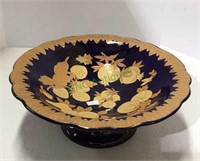 Beautiful pedestal bowl with fruit motif and gold