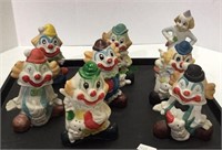 Lot of assorted clown ceramic figurines measuring