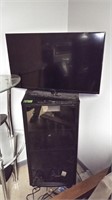 Insignia Flat Screen TV w/Stereo Cabinet.  No