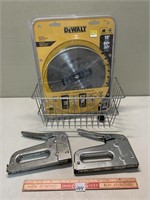 10 INCH DEWALT SAW BLADE WITH SOME USE AND STAPLE