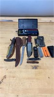 Variety Of Hunting Knives and Knife Sharpener