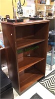 Three shelf bookcase with two adjustable shelves,