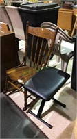 Pine rocking chair and a black piano bench, the