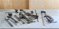 Assortment of metal stakes and clamps