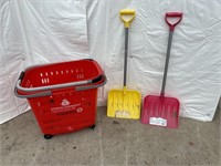 Red shopping cart and 2 plastic shovels